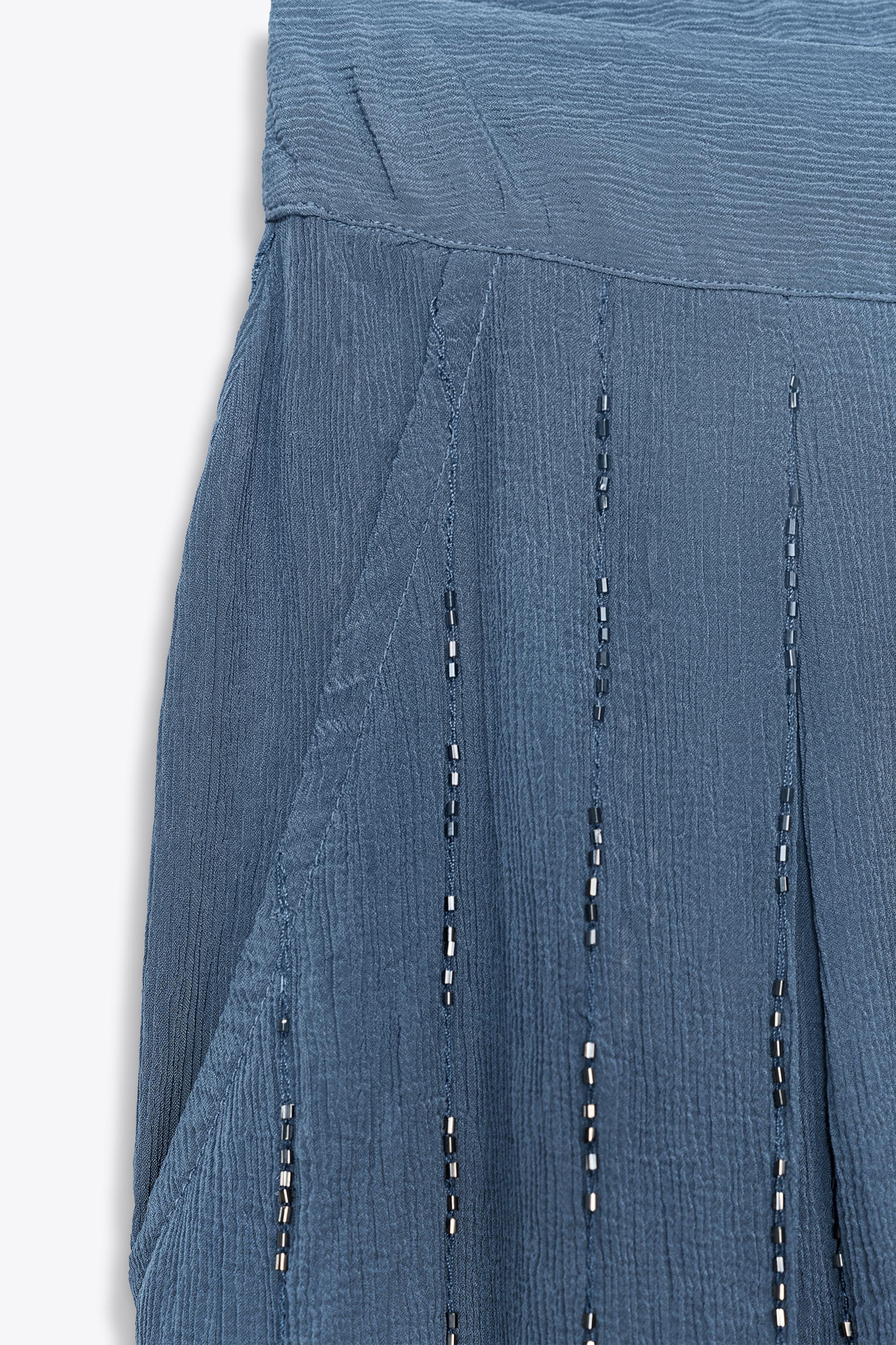 BEADED PANTS WITH TIED HEMS